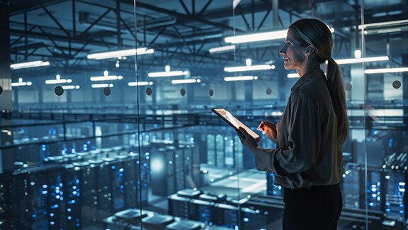 Technician looking into tablet
